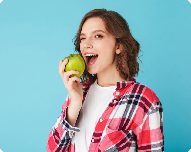 women eating mango